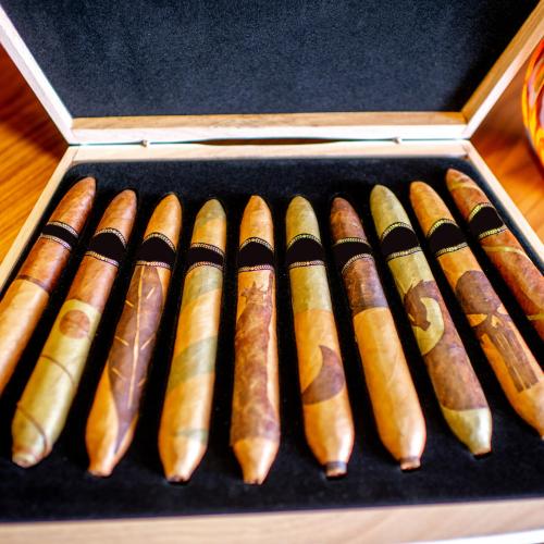 Close-up of luxury cigar set on the wooden table indoors